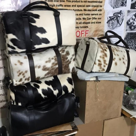 Cow Skin Duffle Bags