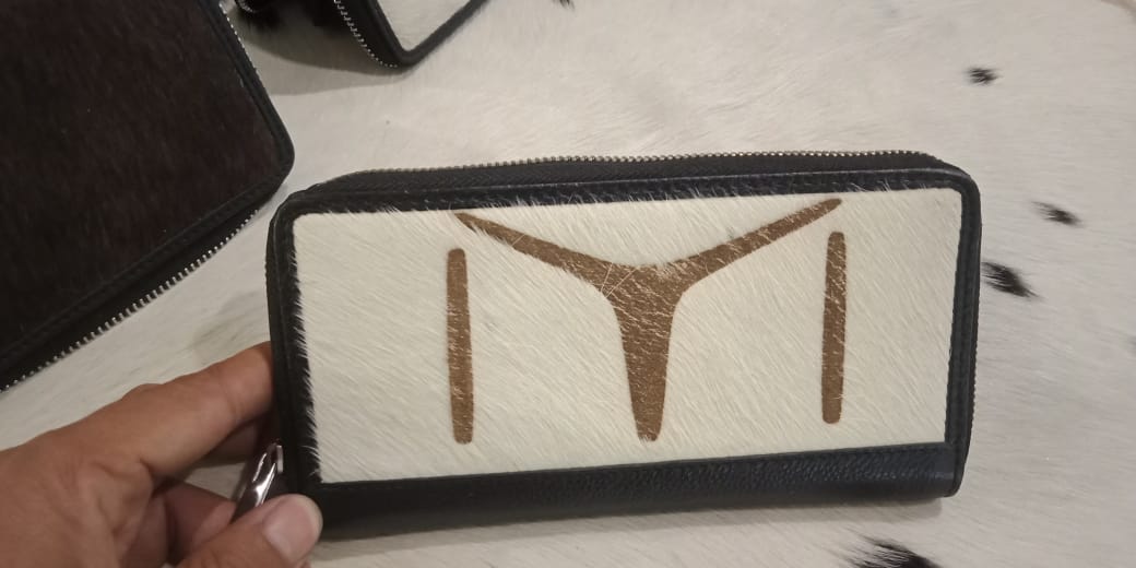 Cow skin ladies clutches