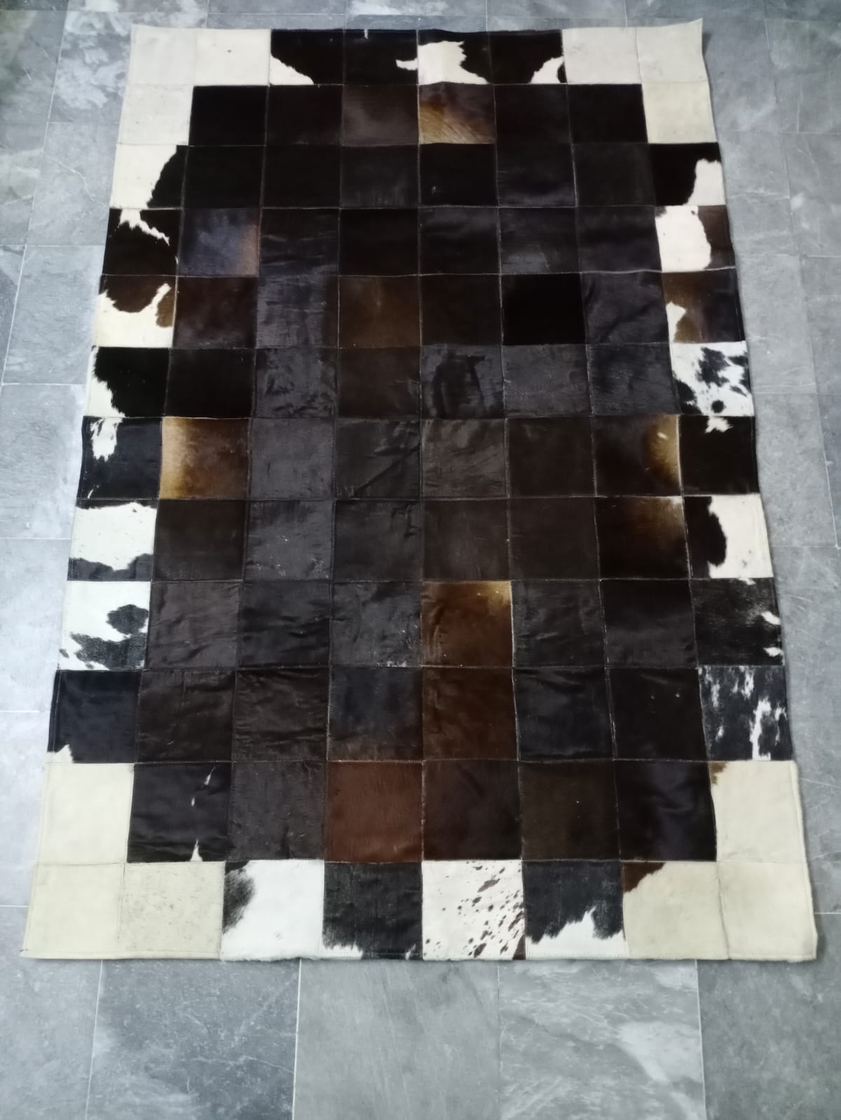 cow skin patchwork rug