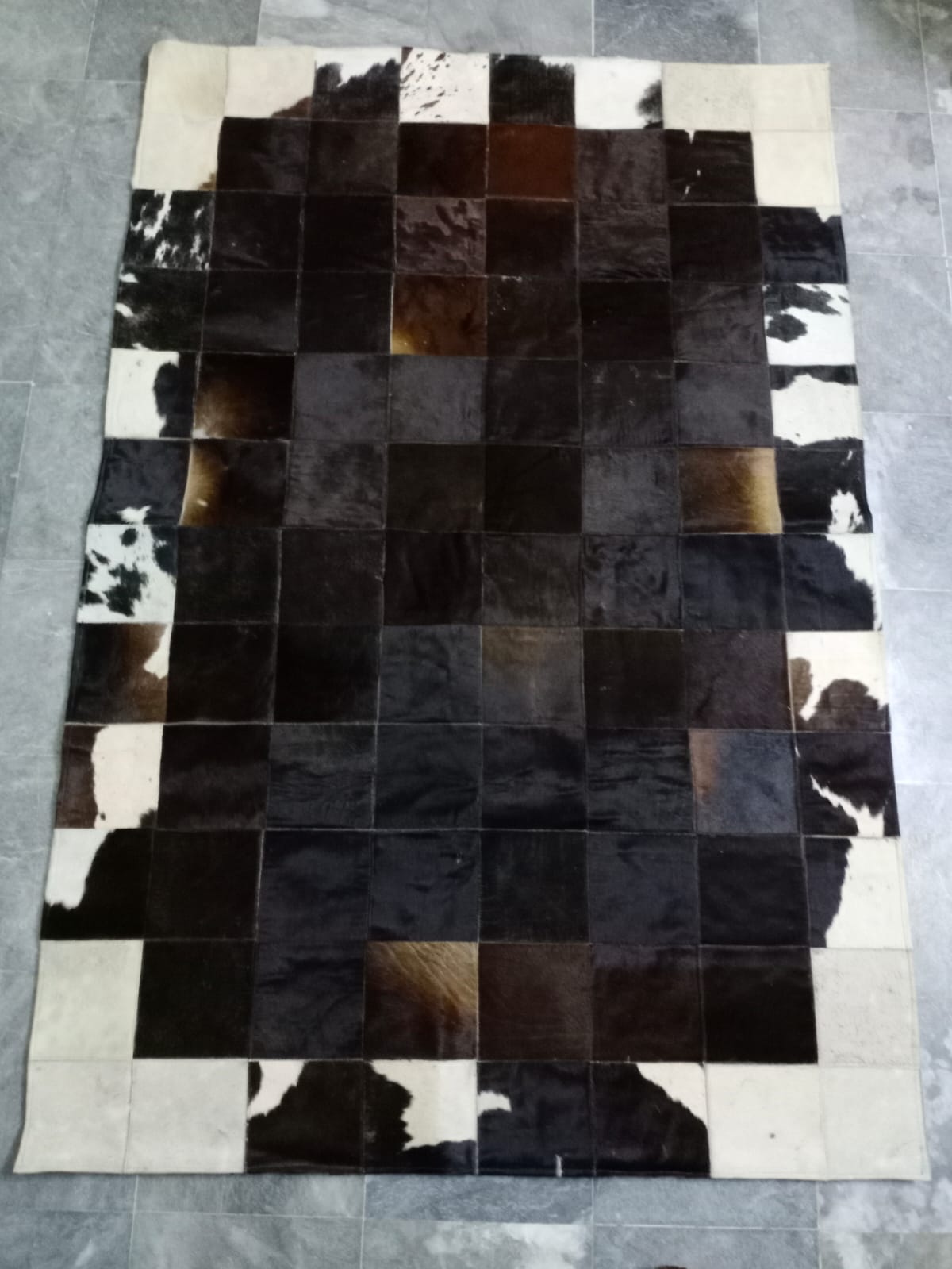 cow skin patchwork rug