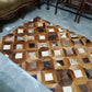 cow skin patchwork rug