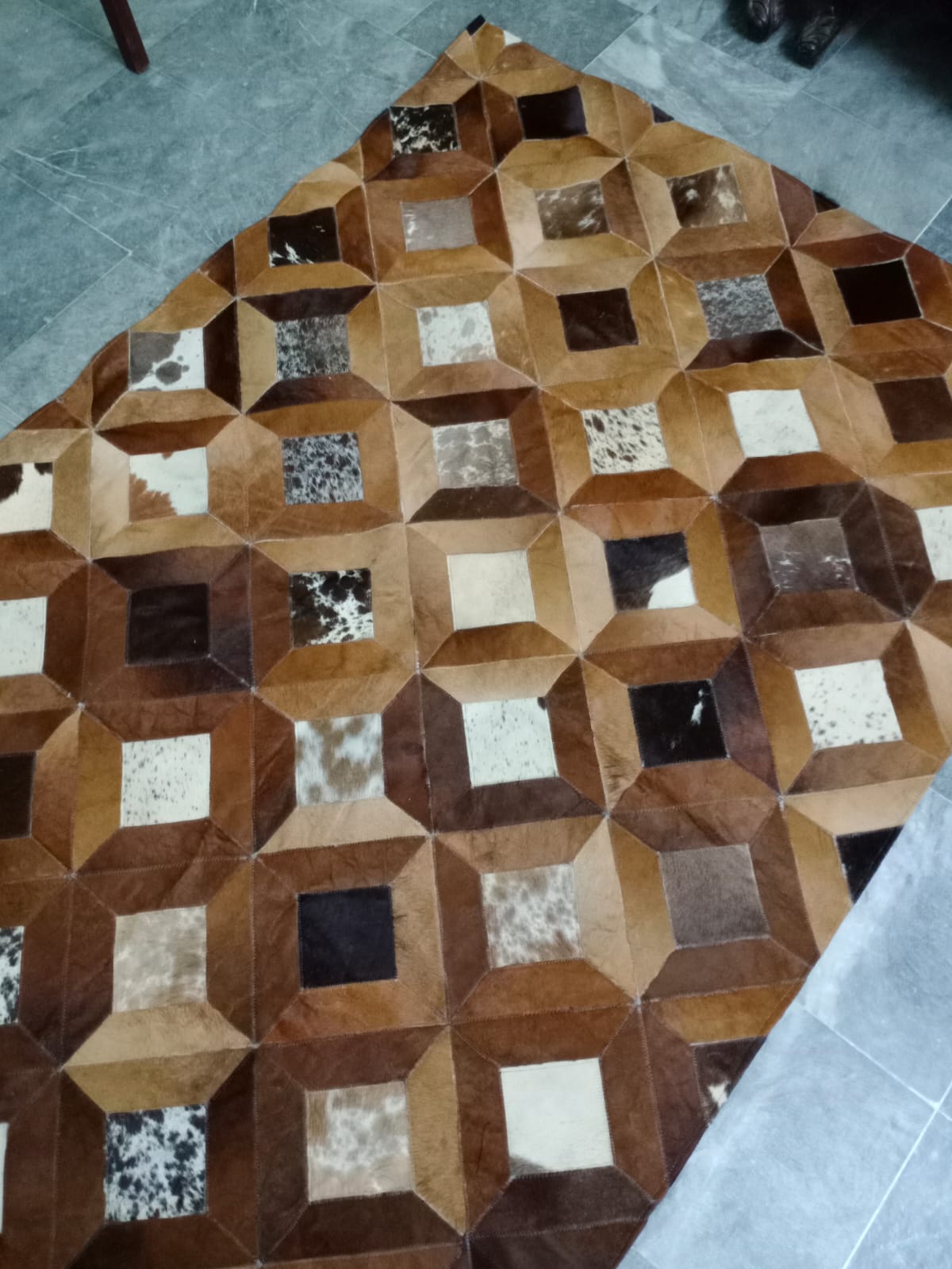 cow skin patchwork rug